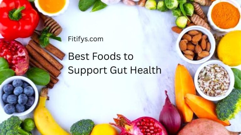 "An inviting overhead shot showcasing a vibrant border of foods beneficial for gut health, including fruits like blueberries and bananas, vegetables like bell peppers and broccoli, spices like turmeric and cinnamon sticks, almonds, and seeds, surrounding the text 'Fitifys.com Best Foods to Support Gut Health' in the center."