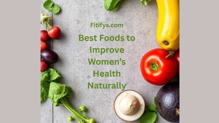 Flat lay of fresh vegetables, including spinach, strawberries, eggplants, yellow squash, tomato, avocado, and a mushroom, arranged around text that reads: "Fitifys.com – Best Foods to Improve Women’s Health Naturally," on a gray stone background.