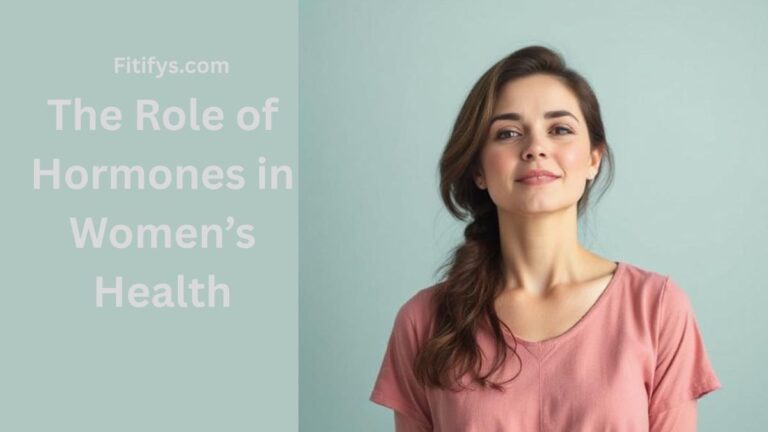 A young woman with long brown hair in a side braid, wearing a pink shirt, stands confidently against a light green background. On the left side, text reads: "Fitifys.com – The Role of Hormones in Women’s Health."