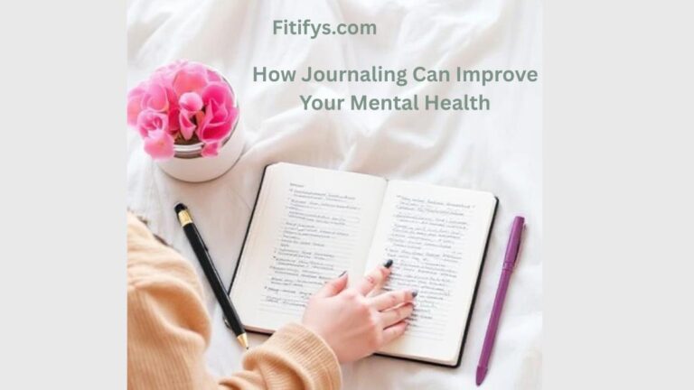 A person journaling in an open notebook while sitting on a bed with white sheets. A pink flower pot, a black pen, and a purple pen are placed nearby. The text on the image reads: “Fitifys.com – How Journaling Can Improve Your Mental Health.”
