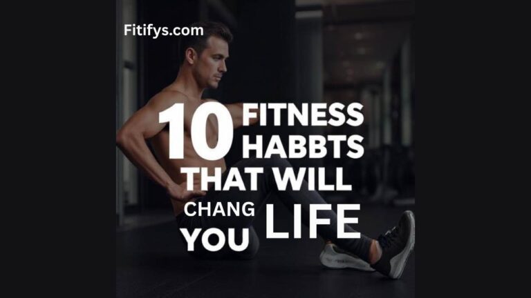 A fit man in workout attire is performing an abdominal exercise in a gym. Bold white text over the image reads: "10 Fitness Habits That Will Change Your Life." The word "Habits" is misspelled as "Habbts," and "Change" is misspelled as "Chang." The website "Fitifys.com" appears at the top.